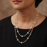 Elegancka złota kolia z małą perłą
